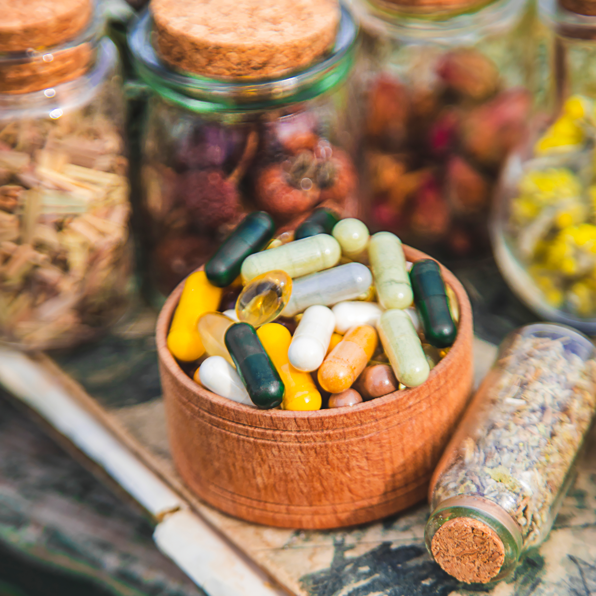 Dried medicinal herbs on the table. Selective focus. Food supplements